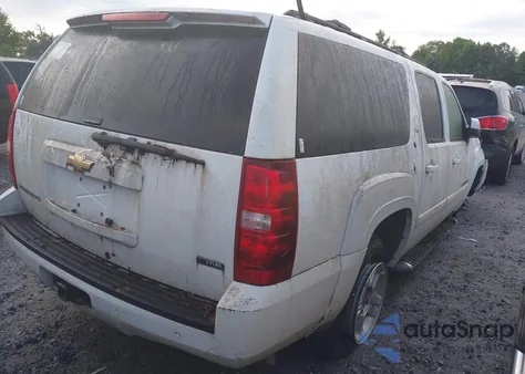 2009 Chevrolet Suburban 1500 Lt2 z USA, uszkodzony, nr VIN 1GNFK26399R206354